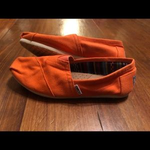 Women’s TOMS orange size 7.5